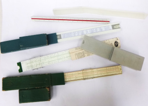 Lot 36 - 4 x Vintage Slide Rules inc, Faber Castell, Fuji & a triangular Lot 36 - 4 x Vintage Slide Rules inc, Faber Castell, Fuji & a triangular