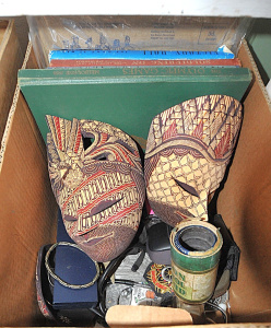 Lot 105 - Box lot of assorted items inc, masks, Nikon camera, belt buckles, bott Lot 105 - Box lot of assorted items inc, masks, Nikon camera, belt buckles, bott