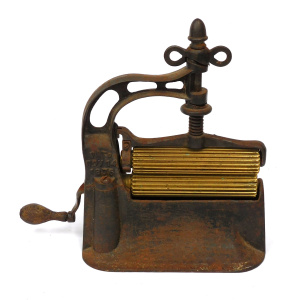 Lot 248 - Early 19th Century Cast iron hand Crank Crimper - Pleater with brass r Lot 248 - Early 19th Century Cast iron hand Crank Crimper - Pleater with brass r