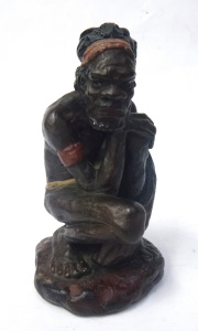 Lot 260 - Artist Unknown - c1951 Australian Ceramic Figure of a Seated Aborigina Lot 260 - Artist Unknown - c1951 Australian Ceramic Figure of a Seated Aborigina