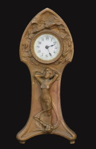 Lot 266 - Art Nouveau Heavy Brass Easel Clock - Clock face surrounded with rais Lot 266 - Art Nouveau Heavy Brass Easel Clock - Clock face surrounded with rais