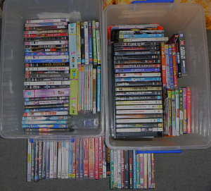 2 Boxes of DVDs inc Fear and Loathing in Las Vegas, Cheers, Cars, Black Hawk Dow