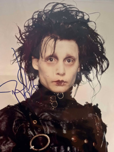 Lot 98 - Johnny Depp Signed coloured portrait photograph as Edward Scissorhands