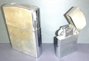 Lot 279 - 2 x vintage novelty oversized cigarette lighters marked Japanese to ba