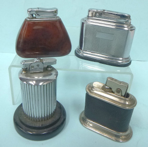 Lot 281 - 4 x Vintage stylish shaped table cigarette lighters