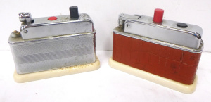 Lot 324 - 2 x Vintage Barclay table cigarette lighters with push button mechanis