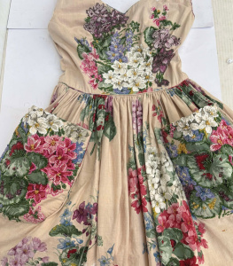 Lot 202 - 1950s floral cotton dress - floral pattern heavily beaded to front and Lot 202 - 1950s floral cotton dress - floral pattern heavily beaded to front and