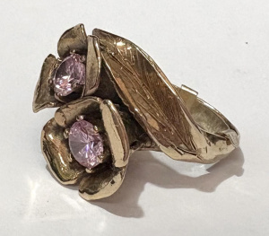 Lot 367 - 9ct gold Dress ring - two flowers each claw set with pink Tourmalines Lot 367 - 9ct gold Dress ring - two flowers each claw set with pink Tourmalines