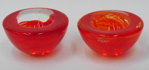 Lot 378 - Pair Glass Kosta Boda Red Atoll Votive designed by Anna Ehrner 11cm D