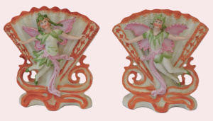 Lot 383 - Pair Victorian Bisque vases with raised fairies to front 17cm H Lot 383 - Pair Victorian Bisque vases with raised fairies to front 17cm H