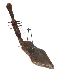 Lot 149 - Unusual African tribal stringed instrument with figural neck - wound a