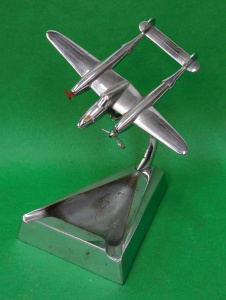 Lot 271 - Mounted P38 Lighting Plane chrome Ashtray Triangular base 18cm H