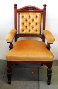 Lot 9 - Edwardian tall armchair with angled finials , button back & matching