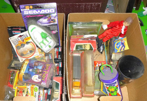 Lot 93 - 2 boxes of boxed and loose toys inc Atlanta Braves Baseball, Austin Pow
