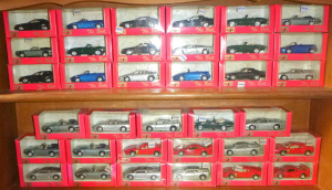 Lot 100 - Large Group Lot of Boxed Maisto diecast sports cars Trophy series inc