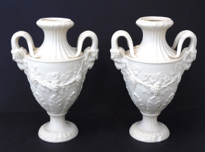 Lot 384 - Pair Late 1800s Parian Ware Urn Vases - Embossed Grape & Vine patt Lot 384 - Pair Late 1800s Parian Ware Urn Vases - Embossed Grape & Vine patt