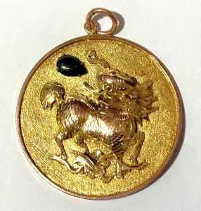 Lot 204 - 14k Gold Chinese symbol coin token pendant with Zodiac dragon & ja