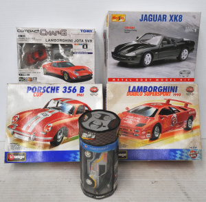 Lot 82 - Lot of 124 Scale Made & Unmade Bburago Model Car Kits & 2 x RC