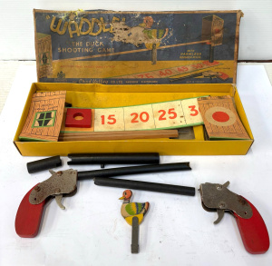 Lot 134 - 1930s boxed Chad Valley Waddle the Duck Shooting Game - damage to lid