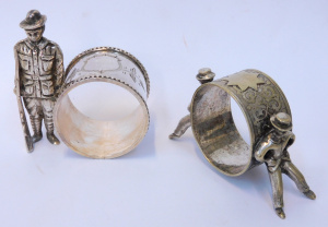 Lot 135 - 2 x EPNS Figural Napkin Rings inc Australian digger