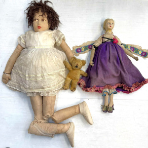 Lot 1 - 2 x 1930s Felt Dolls - one dressed with felt skirt, wearing wooden high