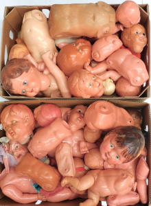 Lot 25 - 2 x Boxes Vintage celluloid Doll parts inc, heads, limbs and torsos - a Lot 25 - 2 x Boxes Vintage celluloid Doll parts inc, heads, limbs and torsos - a