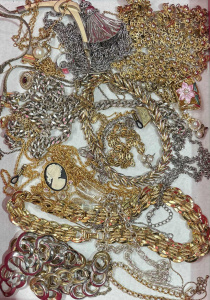 Lot 27 - Box costume jewellery - chains, pendants, necklaces, etc