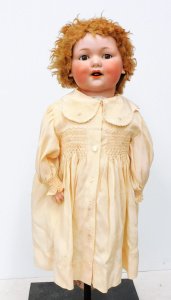 Lot 89 - Early 1900s German Armand Marseilles Bisque Headed Mechanical Doll with