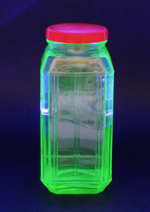 Lot 193 - Vintage Uranium Glass Lidded Jar - Red Bakelite lid 20cm H Lot 193 - Vintage Uranium Glass Lidded Jar - Red Bakelite lid 20cm H