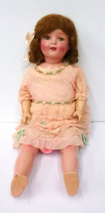 Lot 86 - Circa 1920s - 40s Large Composition Doll with padded torso - sleep eyes