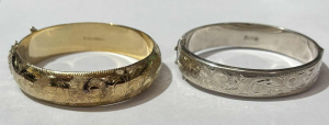 Lot 145 - 2 x bangles - rope twist stamped 925 & unmarked with embossed vine Lot 145 - 2 x bangles - rope twist stamped 925 & unmarked with embossed vine