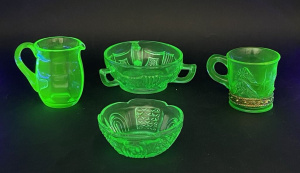 Lot 179 - 4 pces Vintage Uranium Glass inc Creamer 8 5cm H, Cup with gilt lower Lot 179 - 4 pces Vintage Uranium Glass inc Creamer 8 5cm H, Cup with gilt lower