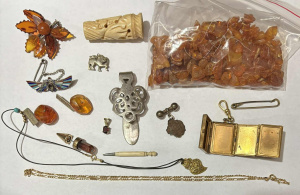 Lot 171 - Grp Small ivory sewing implement, natural amber necklace needs string