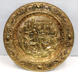 Lot 122 - Vintage Very large Brass Wall Charger with raised supper scene 72cm D