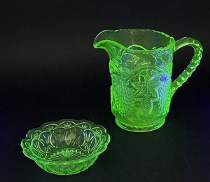 Lot 221 - 2 pces vintage Uranium glass inc Jug with grape & leaf exterior pa