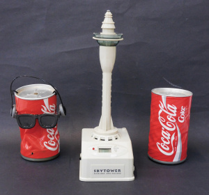 Lot 162 - 3 pces of novelty inc 2 x Dancing Coke-Cola Cans & Sky Tower Auckl