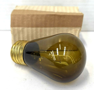 Lot 173 - Vintage NOS Luna Park amber glass screw light Bulb, Luna Park printed