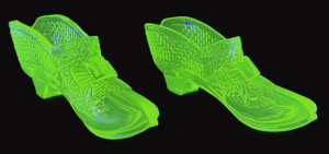 Lot 183 - Pair of Vintage Uranium Glass shoes with bows, approx 12cm L