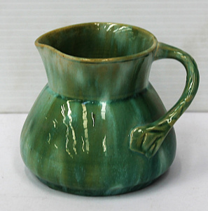 Lot 231 - John Campbell Australian Pottery Jug - green drip glaze with angled br Lot 231 - John Campbell Australian Pottery Jug - green drip glaze with angled br