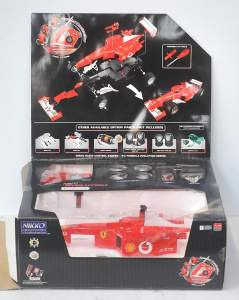 Lot 14 - Nikko Ferrari F2003-GA Formula Evoultion RC Car w Accessories Lot 14 - Nikko Ferrari F2003-GA Formula Evoultion RC Car w Accessories