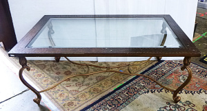 Lot 36 - Large Vintage Glass topped coffee Table with ornate brass tone metal ba Lot 36 - Large Vintage Glass topped coffee Table with ornate brass tone metal ba