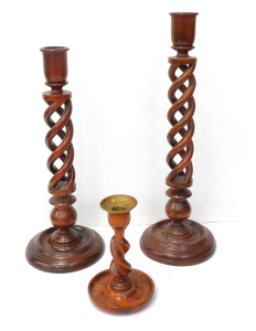 Lot 110 - 3 x Wooden Barley Twist candlesticks 38cm & 43cm H and smallest wi