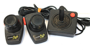 Lot 123 - Set of Vintage Atari game controllers inc Joystic & 2 Paddle Contr