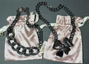 2 x black vintage Mimco necklaces with large chain links,, diamante Bow etc
