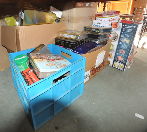 Lot 30 - Large group Lot of 5 x Boxes of Mixed Tins, DVDs & Boxed card Games Lot 30 - Large group Lot of 5 x Boxes of Mixed Tins, DVDs & Boxed card Games