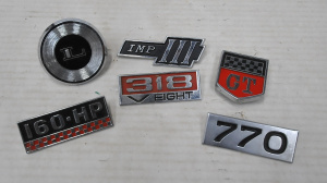 Lot 39 - Group lot - Vintage Car & other Badges - Valiant 318 V8, 160-HP, La