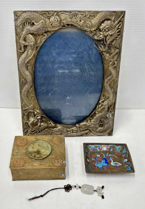 Lot 130 - Grp Oriental - Japanese white metal photo frame with embossed dragon (