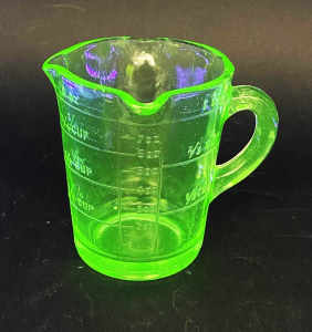 Lot 234 - Vintage Uranium Glass One cup measuring jug - three spouts - 10cm H Lot 234 - Vintage Uranium Glass One cup measuring jug - three spouts - 10cm H