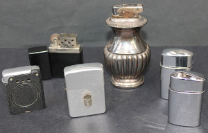 Lot 109 - Group lot - Vintage Fuel Cigarette Lighters - some Windproof incl Omeg Lot 109 - Group lot - Vintage Fuel Cigarette Lighters - some Windproof incl Omeg