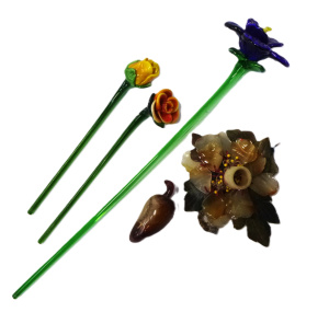 Lot 154 - Group lot stemmed glass flowers and alabaster flower and pepper Lot 154 - Group lot stemmed glass flowers and alabaster flower and pepper